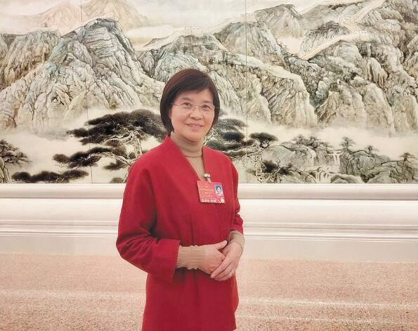 可靠電力助推紡織業綠色智能轉型——訪全國人大代表、江蘇陽光集團黨委書記、江蘇陽光股份有限公司董事長陳麗芬