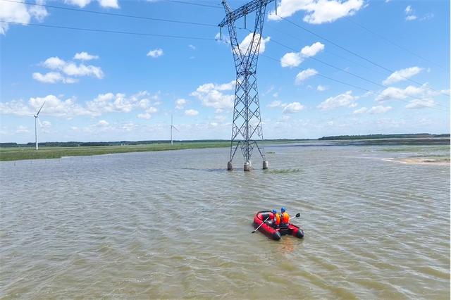 國家電網:黨旗在防汛救災保電一線高高飄揚