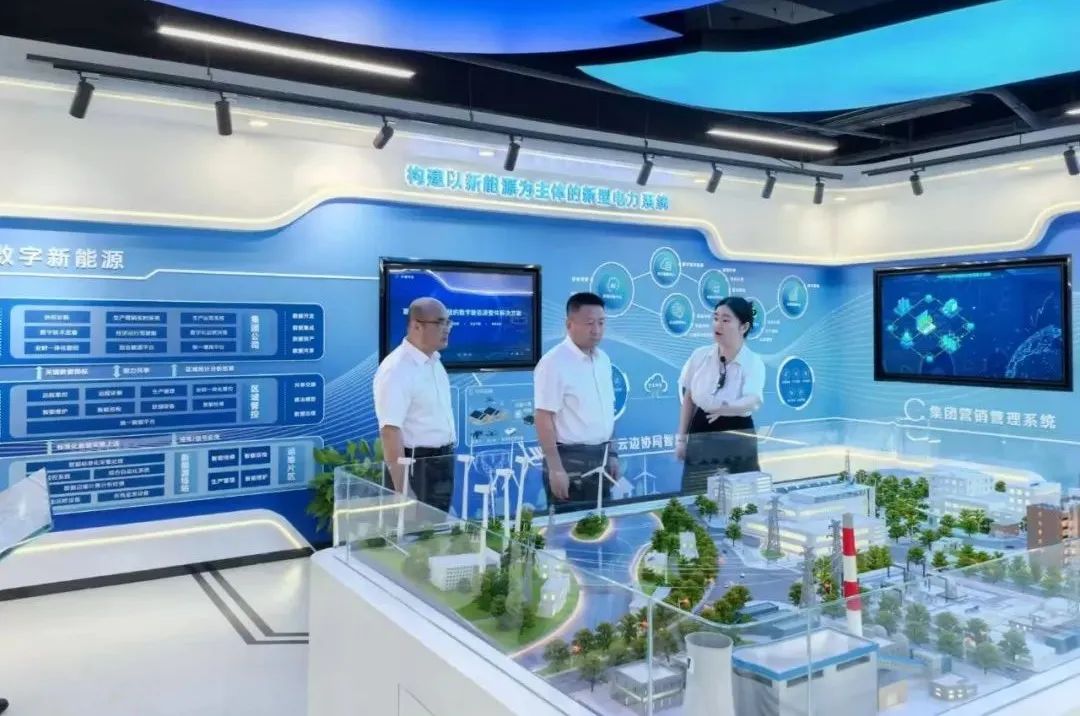 華電內蒙古公司黨委書記、董事長那仁滿都拉與國電南自黨委書記、董事長經海林會談交流