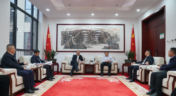 中國電建黨委副書記、總經理王斌與內蒙古電力集團黨委書記、董事長張海峰會談